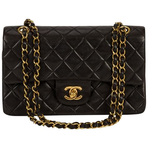 chanel bag gold color|Chanel bag black gold chain.